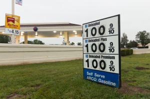 Nice photo of One dollar per gallon gas price sign