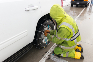 Nice photo of Chain Installer on interstate 80