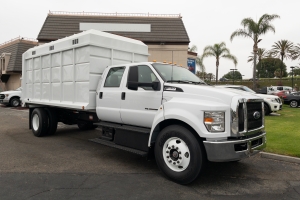 Nice photo of 2023 Ford F650 16 Foot 17.6 Ton Chipper Dump Scelzi Truck Body