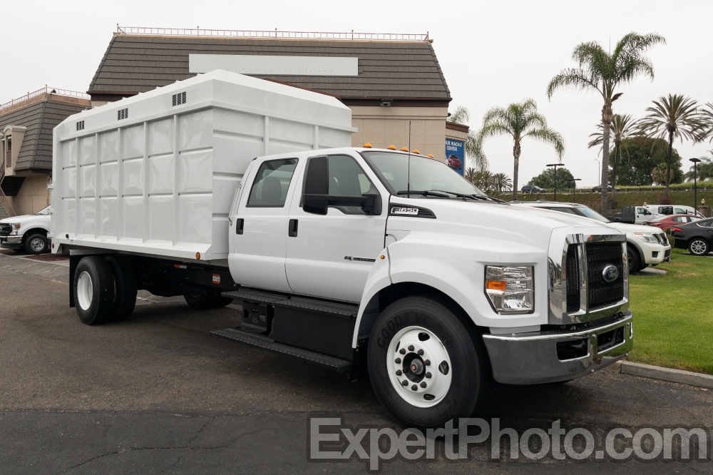 Nice photo of 2023 Ford F650 16 Foot 17.6 Ton Chipper Dump Scelzi Truck Body
